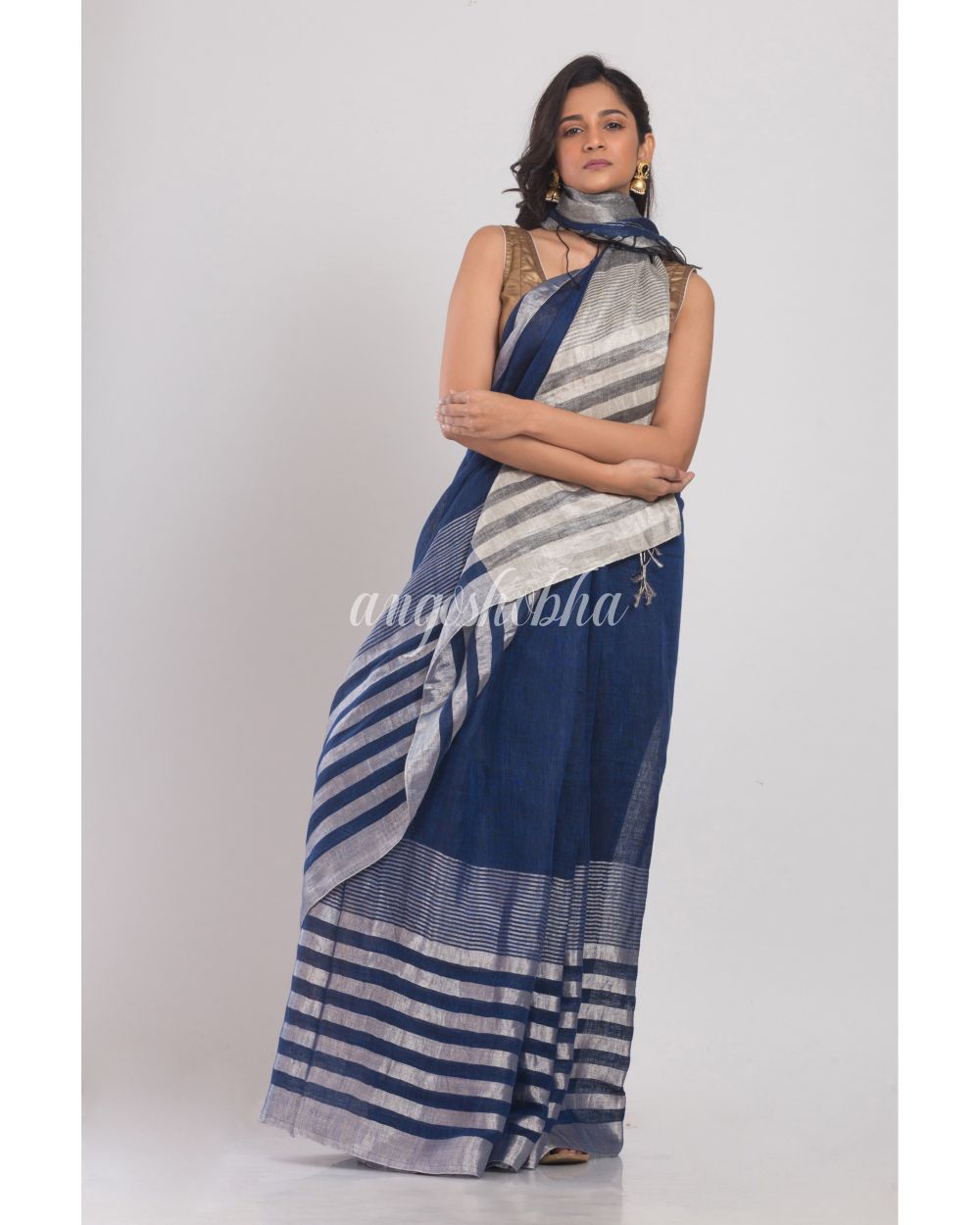 Blue Linen Saree With Silver Zari Pallu And Border angoshobha