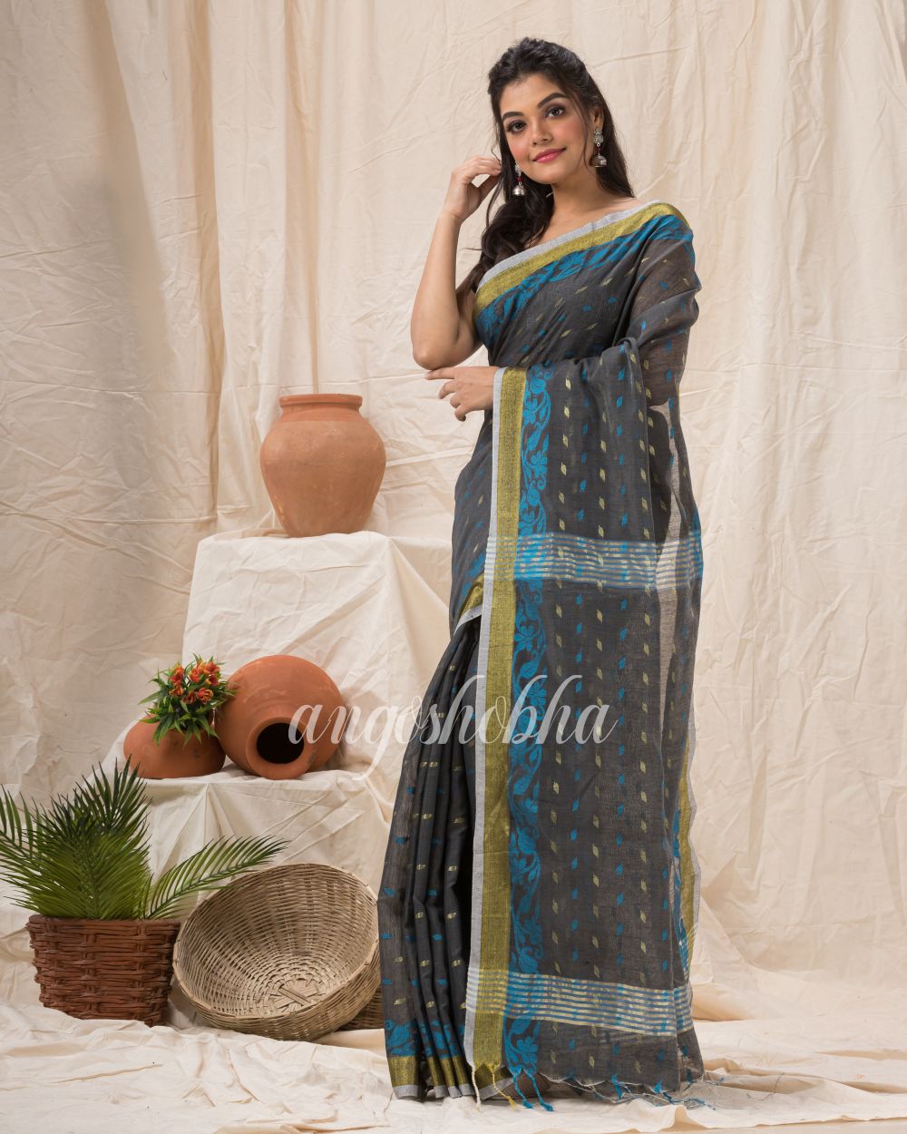 Cotton Blend Dark Ass Handloom Saree angoshobha