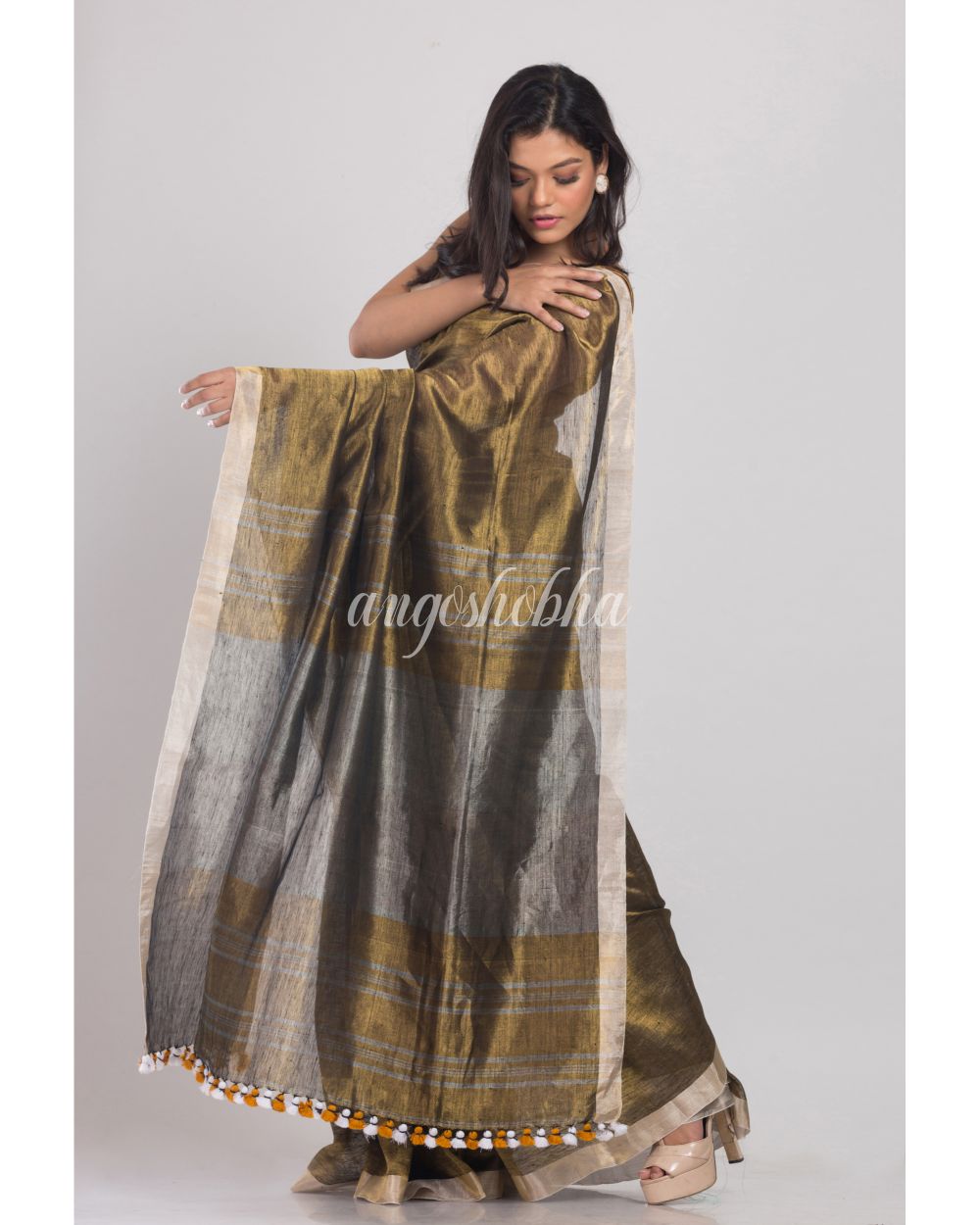 Golden Handwoven Linen Tissue Saree angoshobha