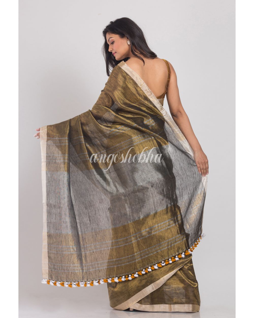 Golden Handwoven Linen Tissue Saree angoshobha