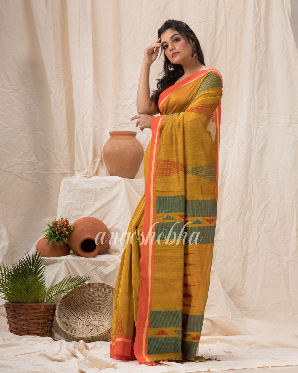 Golden Yellow Cotton Blend Temple Border Jamdani Saree angoshobha