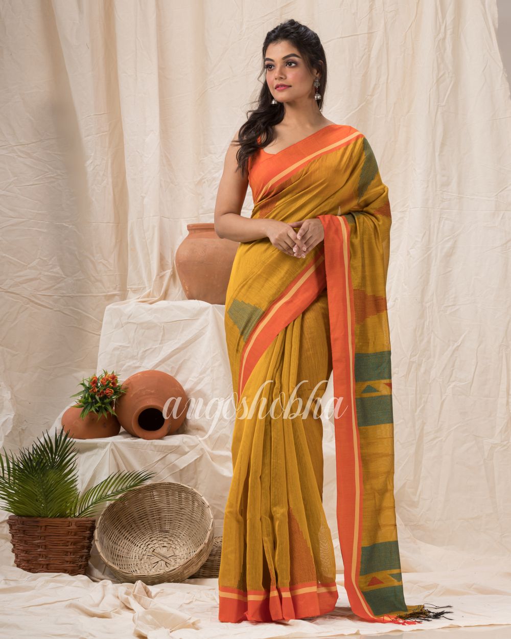 Golden Yellow Cotton Blend Temple Border Jamdani Saree angoshobha