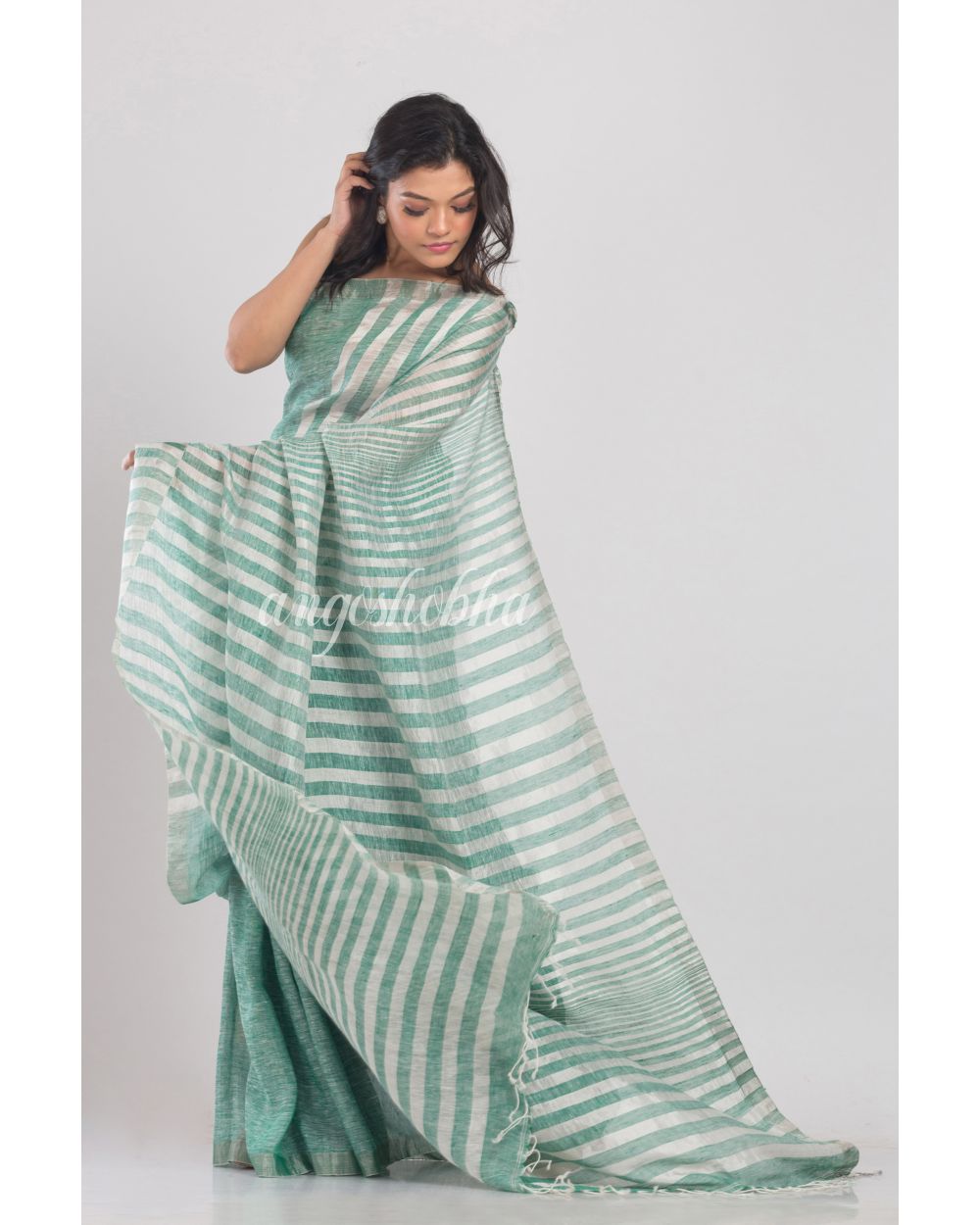 Green Handwoven Linen Saree angoshobha