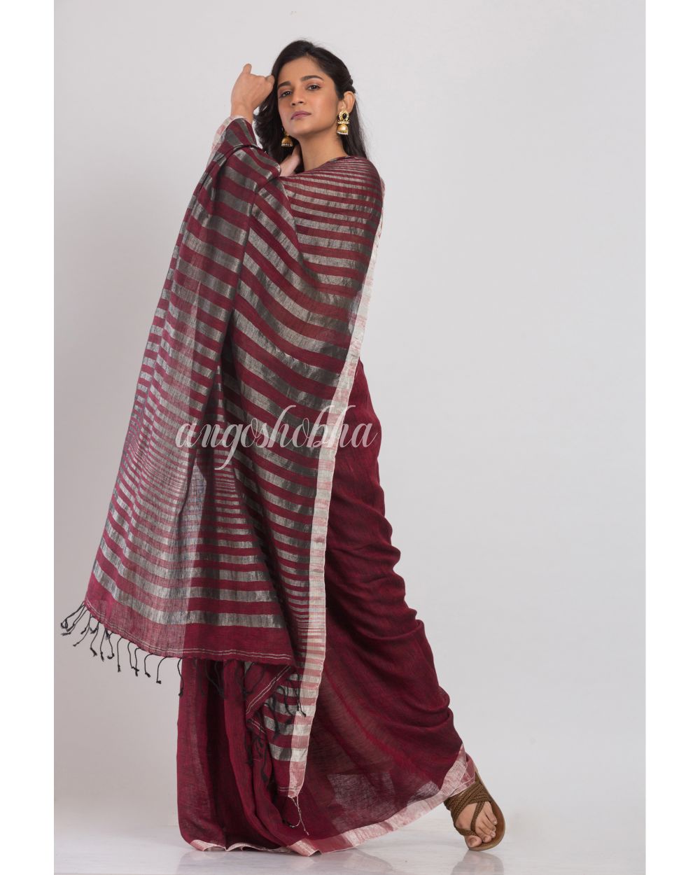 Maroon Linen Saree With Silver Zari Pallu And Border angoshobha