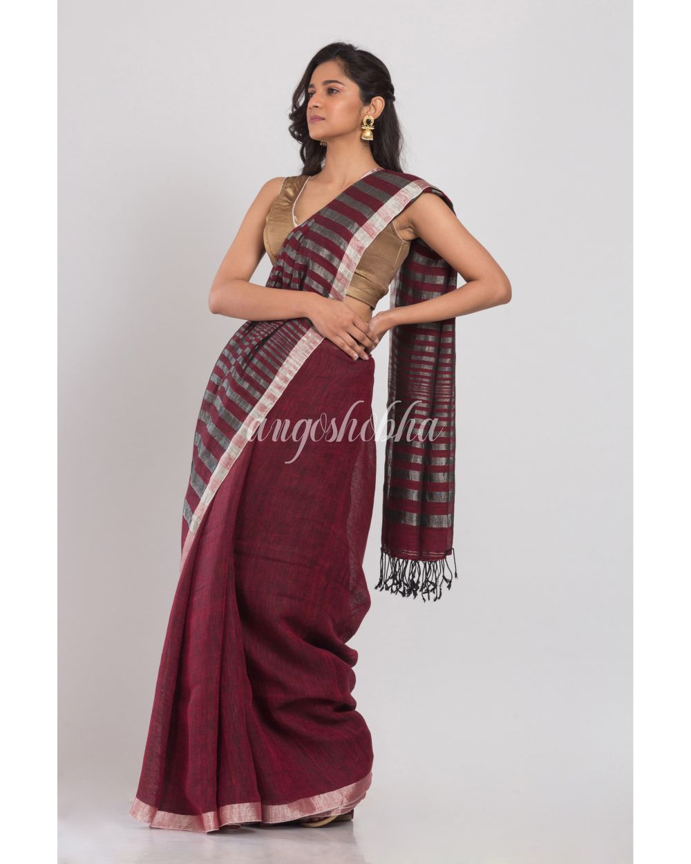Maroon Linen Saree With Silver Zari Pallu And Border angoshobha