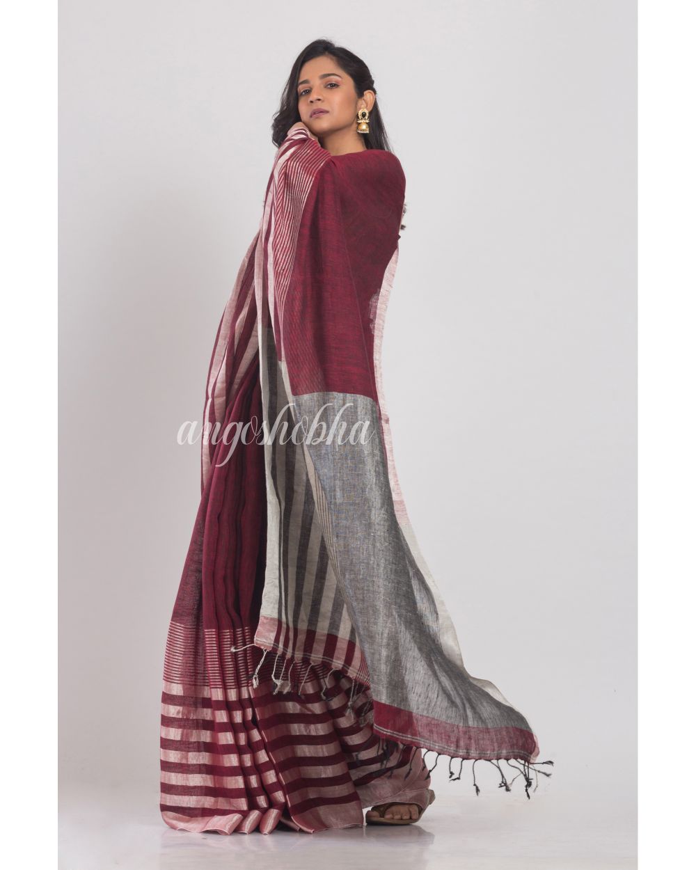 Maroon Linen Saree With Silver Zari Pallu And Border angoshobha