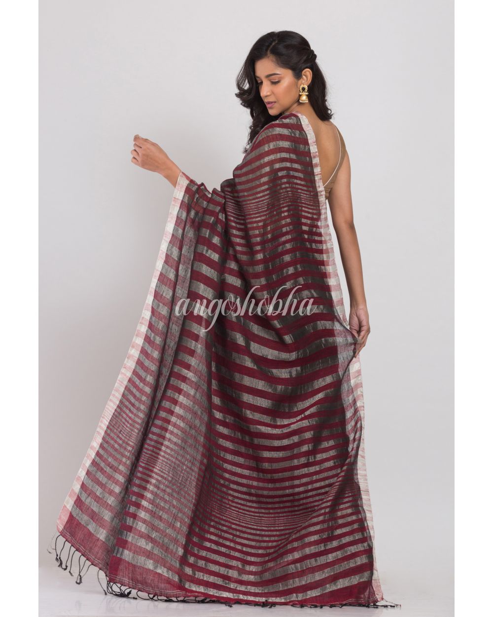 Maroon Linen Saree With Silver Zari Pallu And Border angoshobha