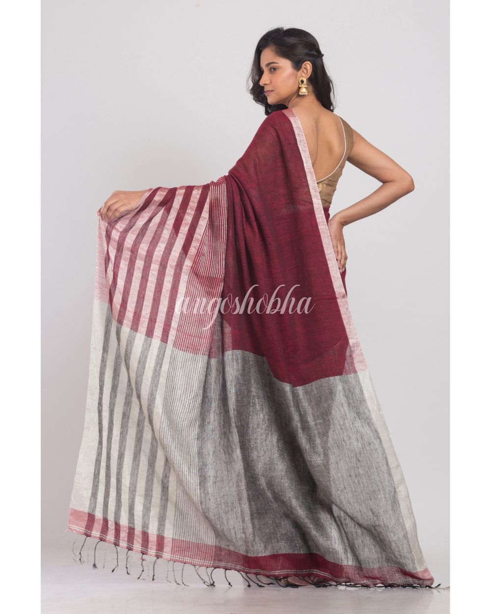 Maroon Linen Saree With Silver Zari Pallu And Border angoshobha