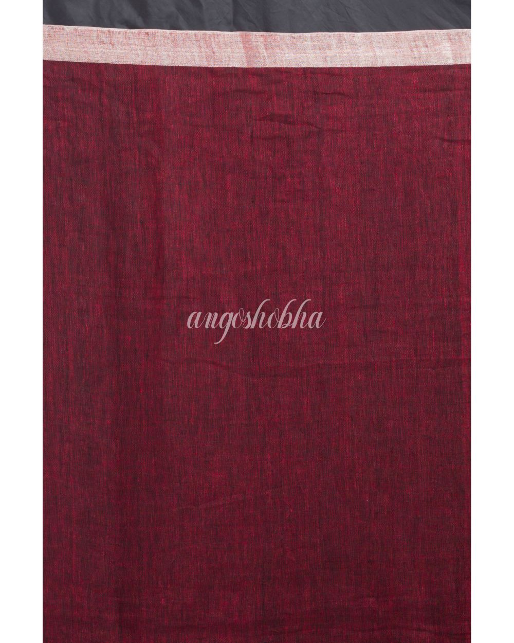 Maroon Linen Saree With Silver Zari Pallu And Border angoshobha