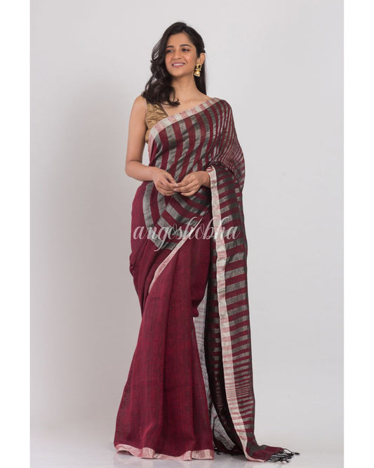 Maroon Linen Saree With Silver Zari Pallu And Border angoshobha