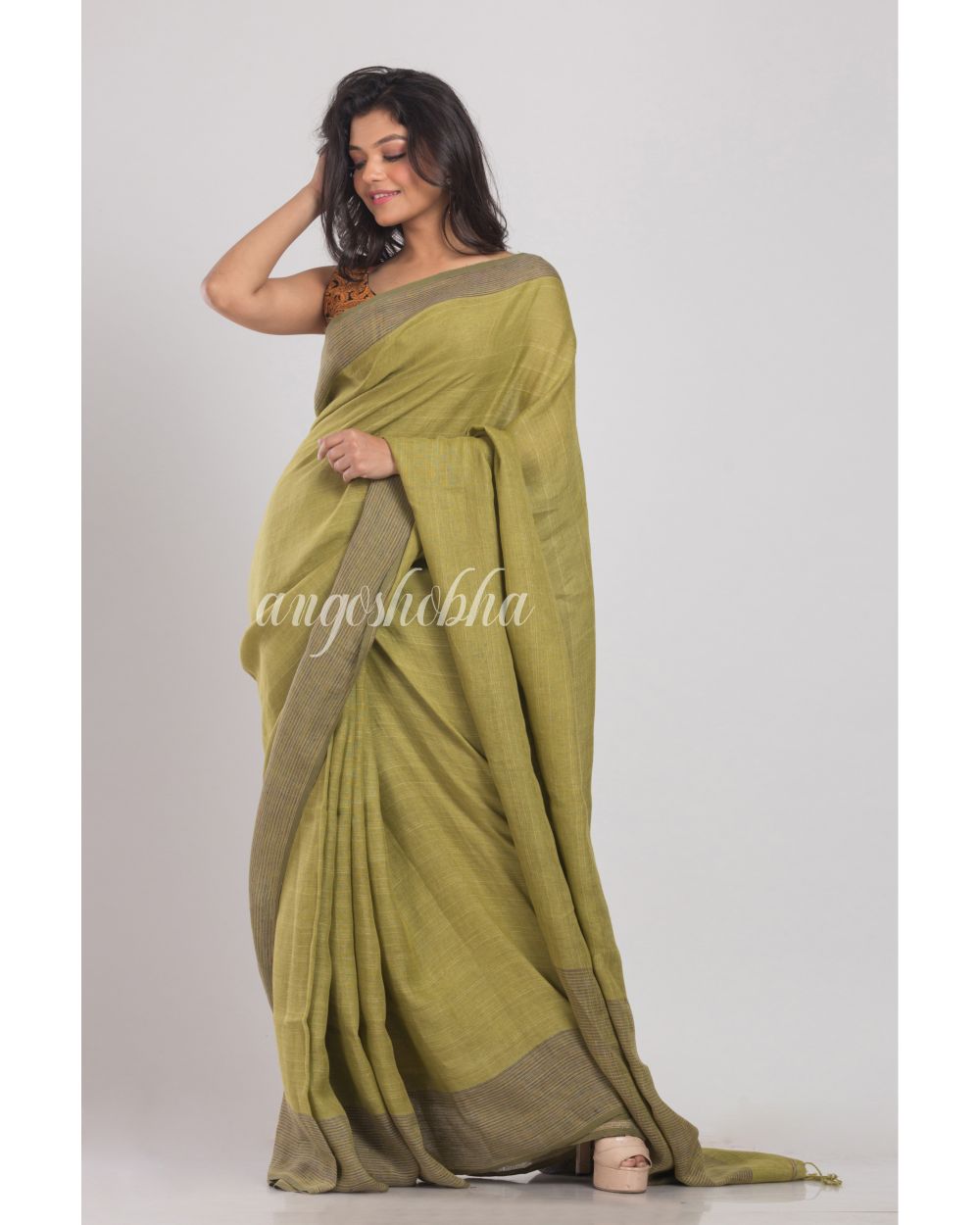 Olive Green Handwoven Linen Saree angoshobha