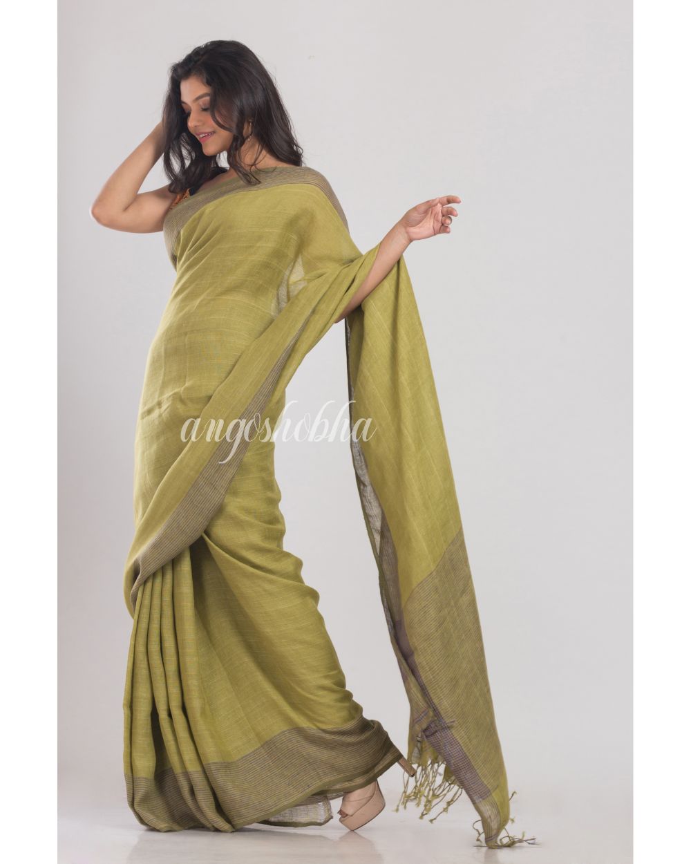 Olive Green Handwoven Linen Saree angoshobha