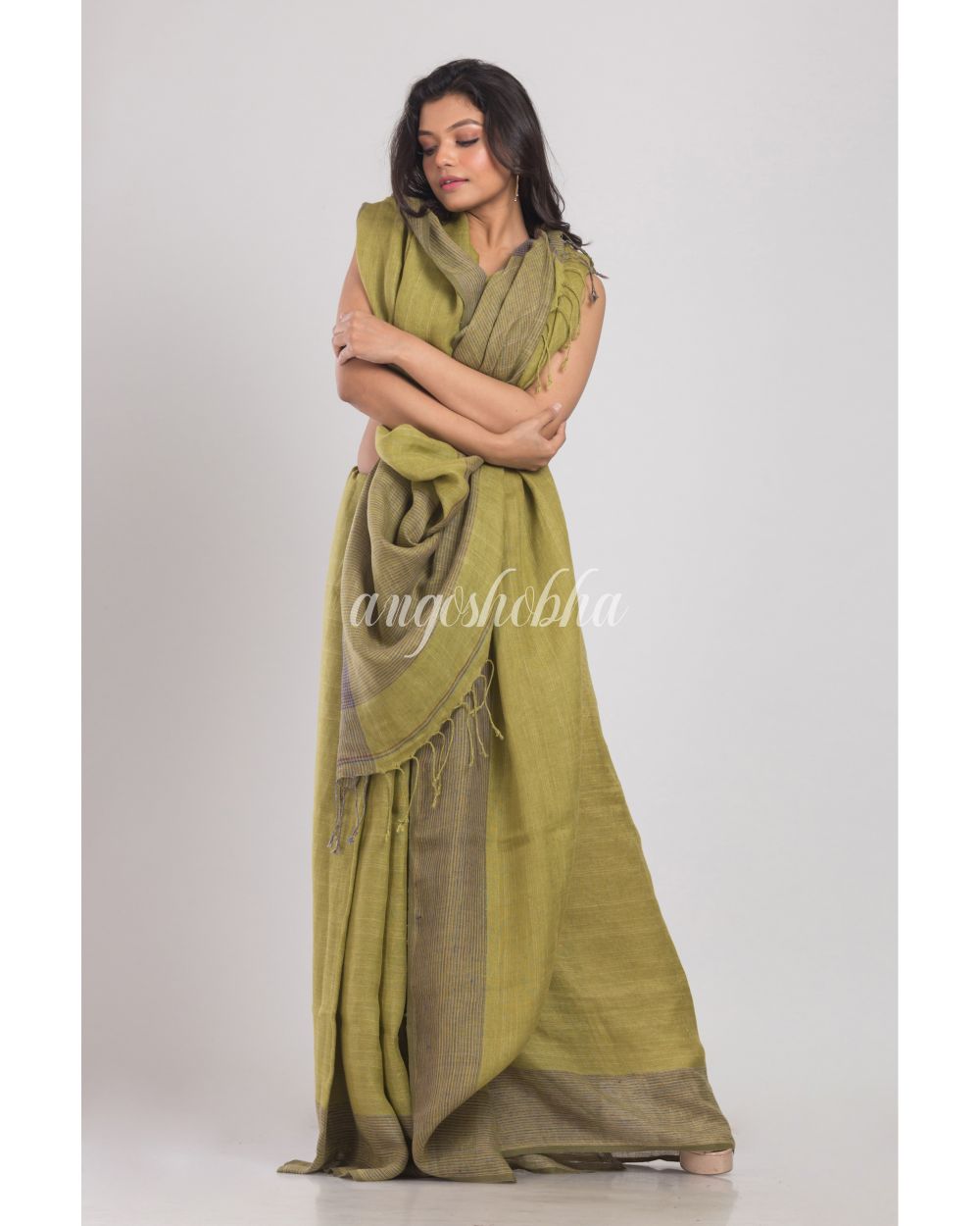 Olive Green Handwoven Linen Saree angoshobha