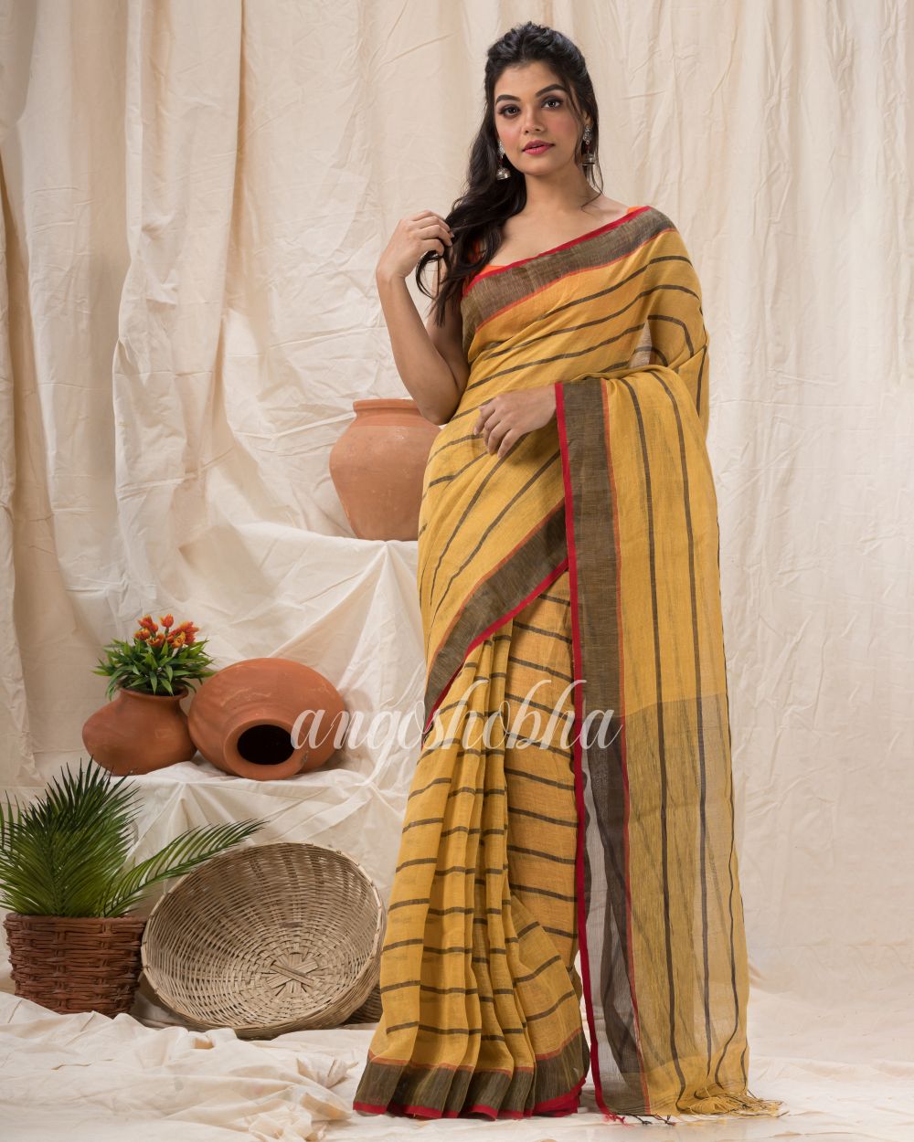 Sandy Brown Traditiona Linen Saree angoshobha