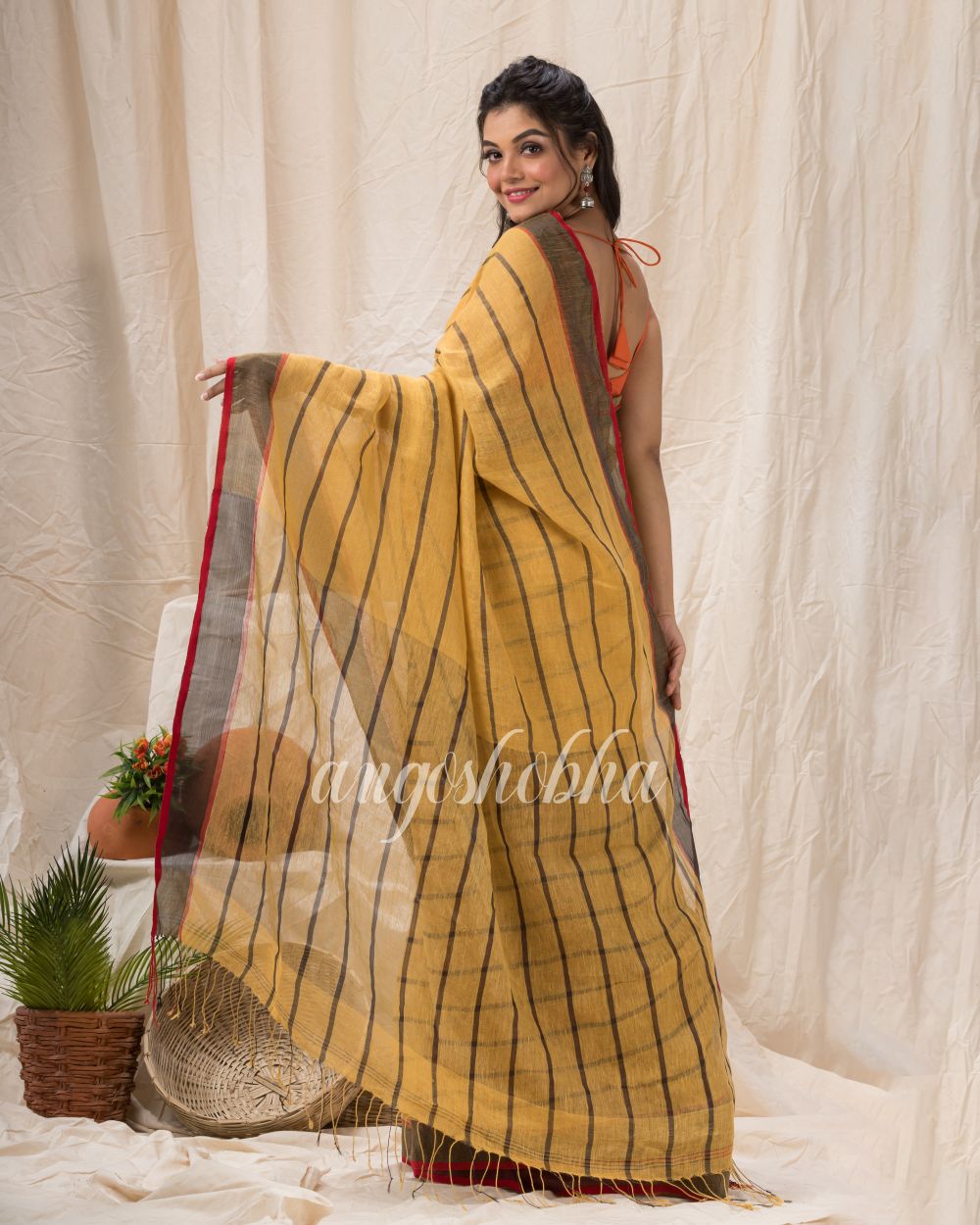 Sandy Brown Traditiona Linen Saree angoshobha