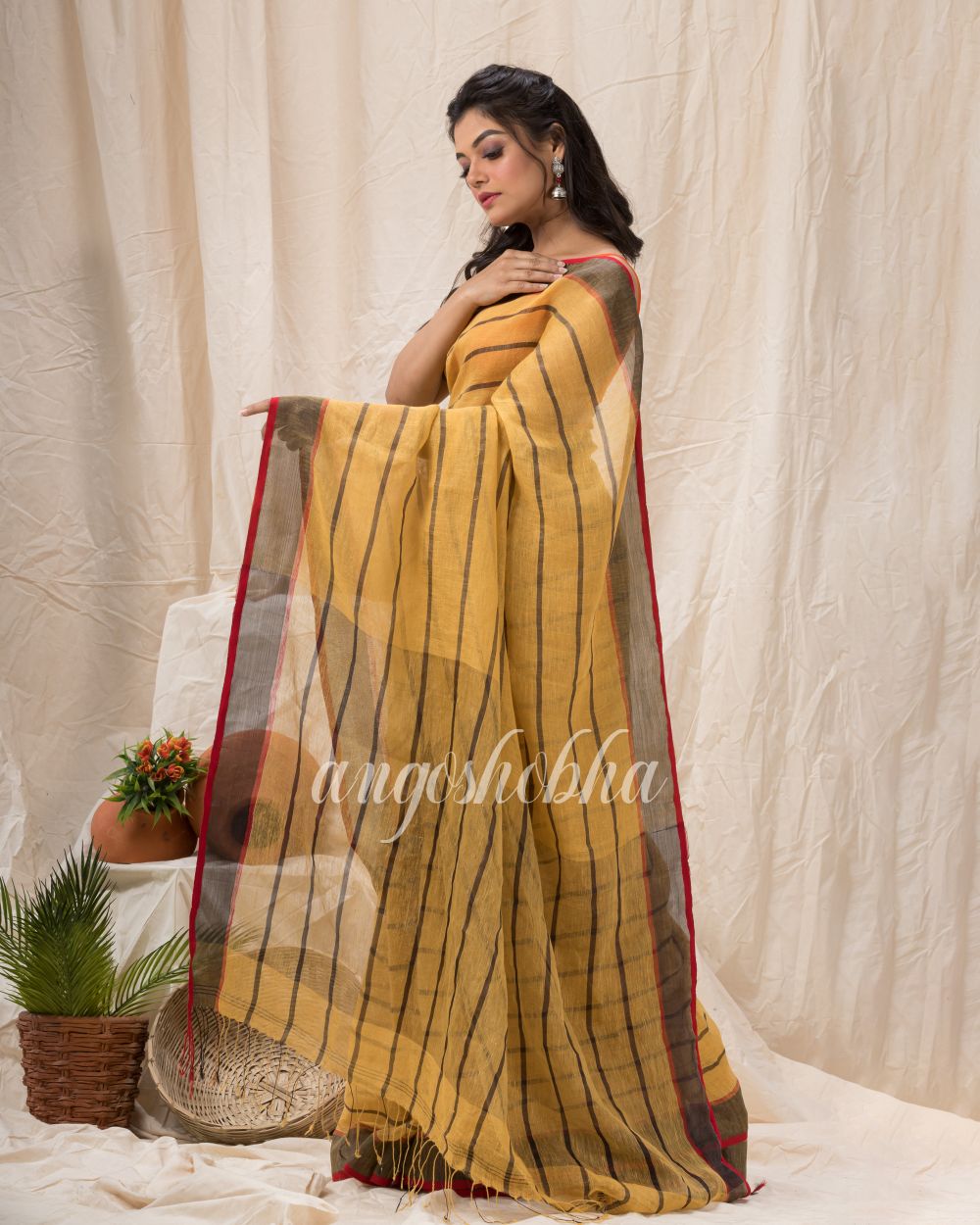 Sandy Brown Traditiona Linen Saree angoshobha