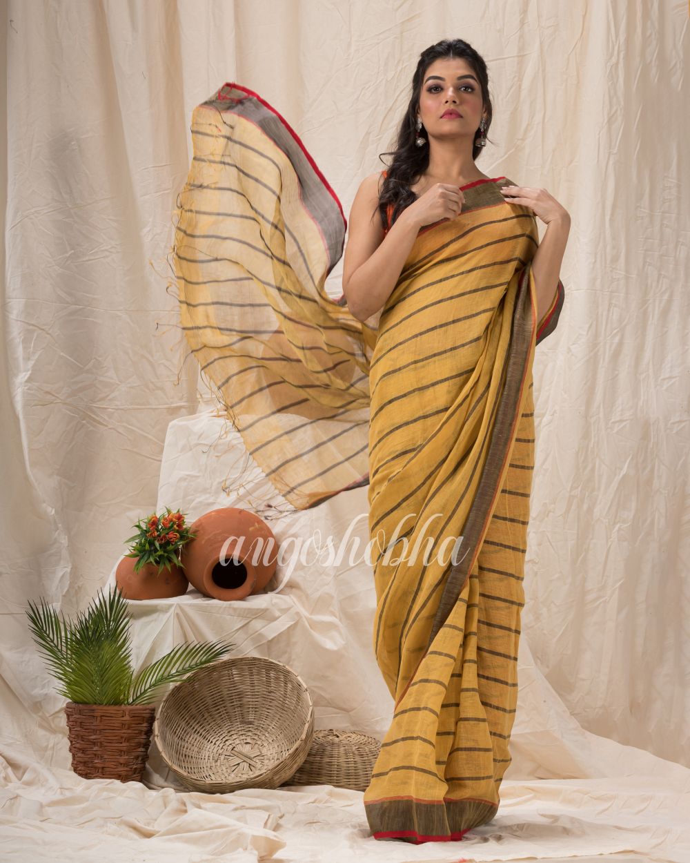 Sandy Brown Traditiona Linen Saree angoshobha