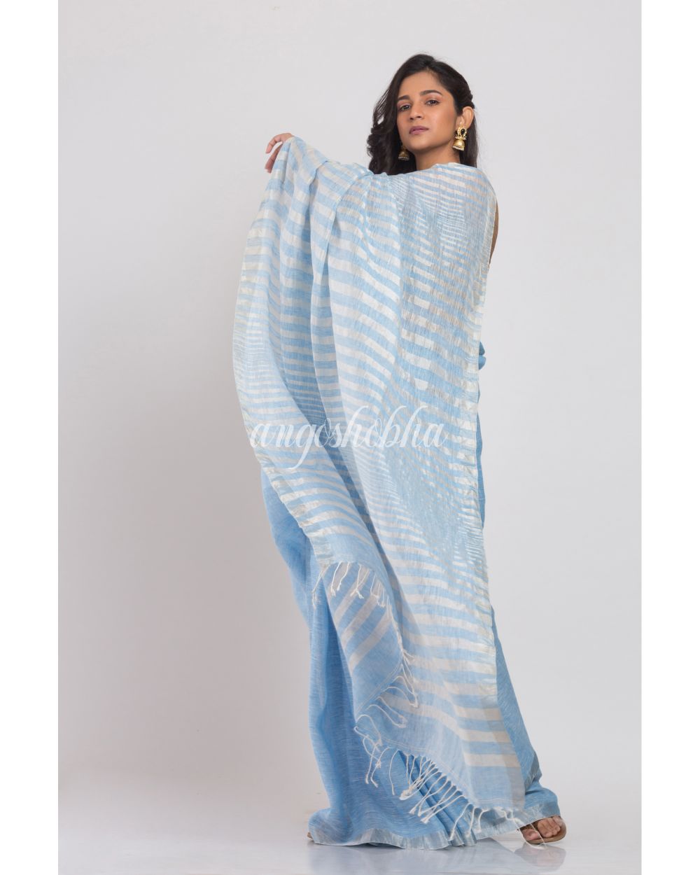 Skyblue Linen Saree With Silver Zari Pallu And Border angoshobha