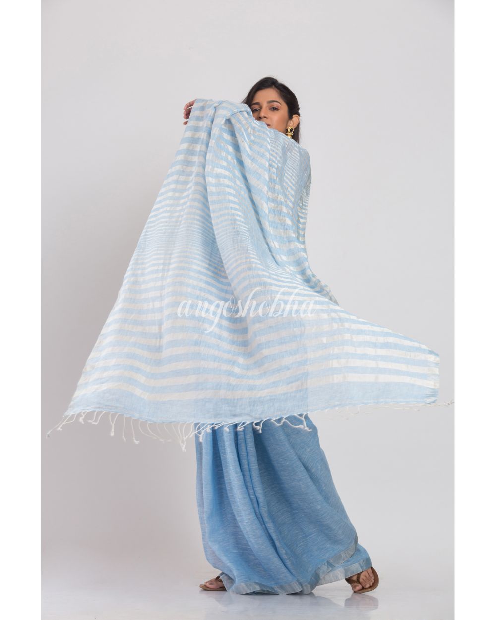 Skyblue Linen Saree With Silver Zari Pallu And Border angoshobha