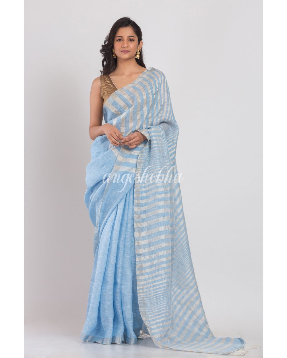 Skyblue Linen Saree With Silver Zari Pallu And Border angoshobha