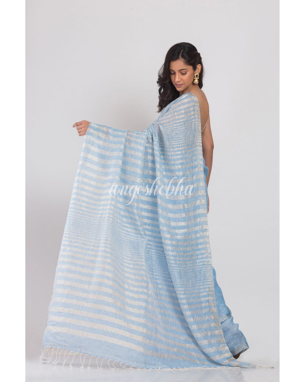 Skyblue Linen Saree With Silver Zari Pallu And Border angoshobha