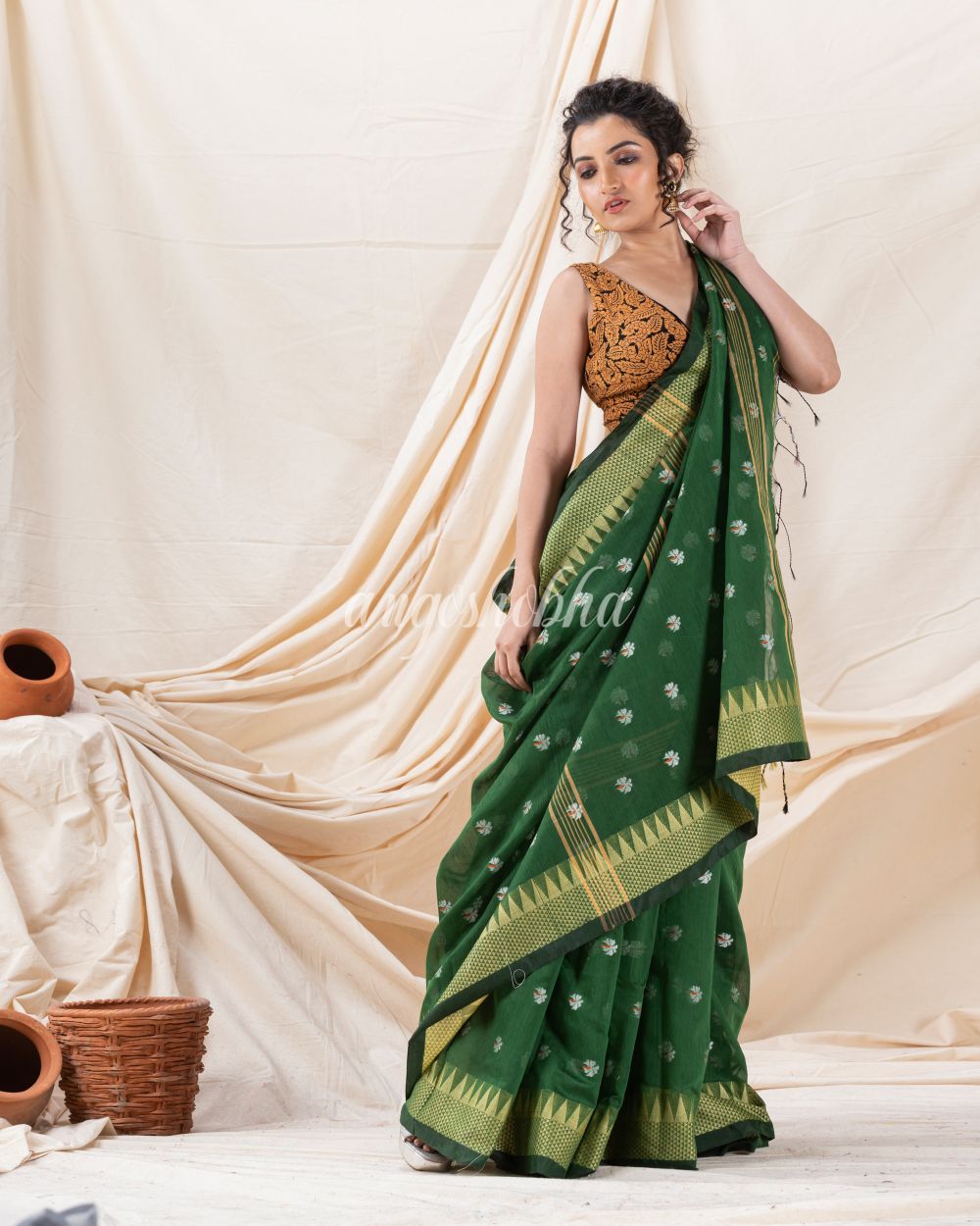 Traditional Cotton Blend Dark Green Handloom Saree angoshobha