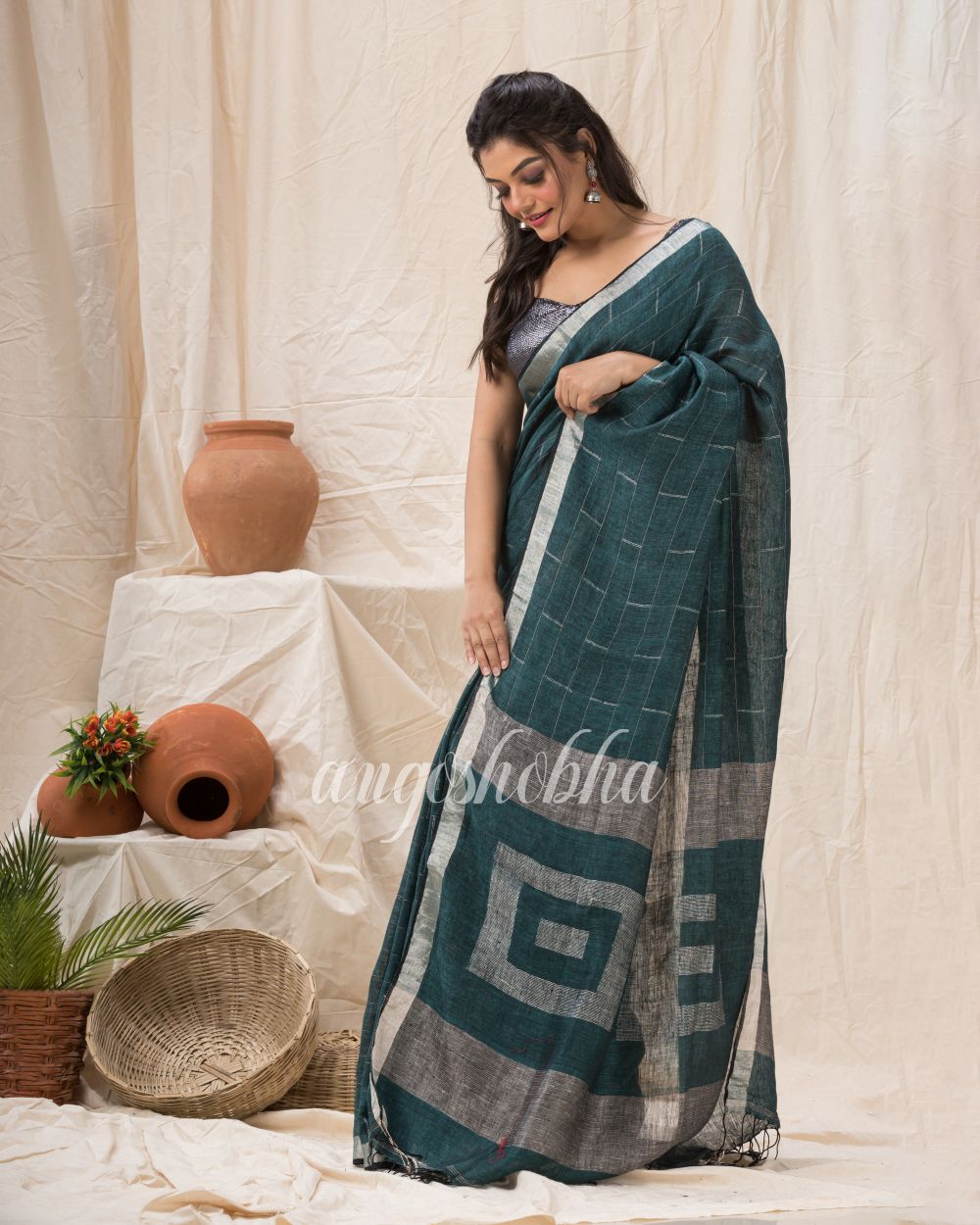 Traditional Dark Green Linen Jamdani Saree angoshobha