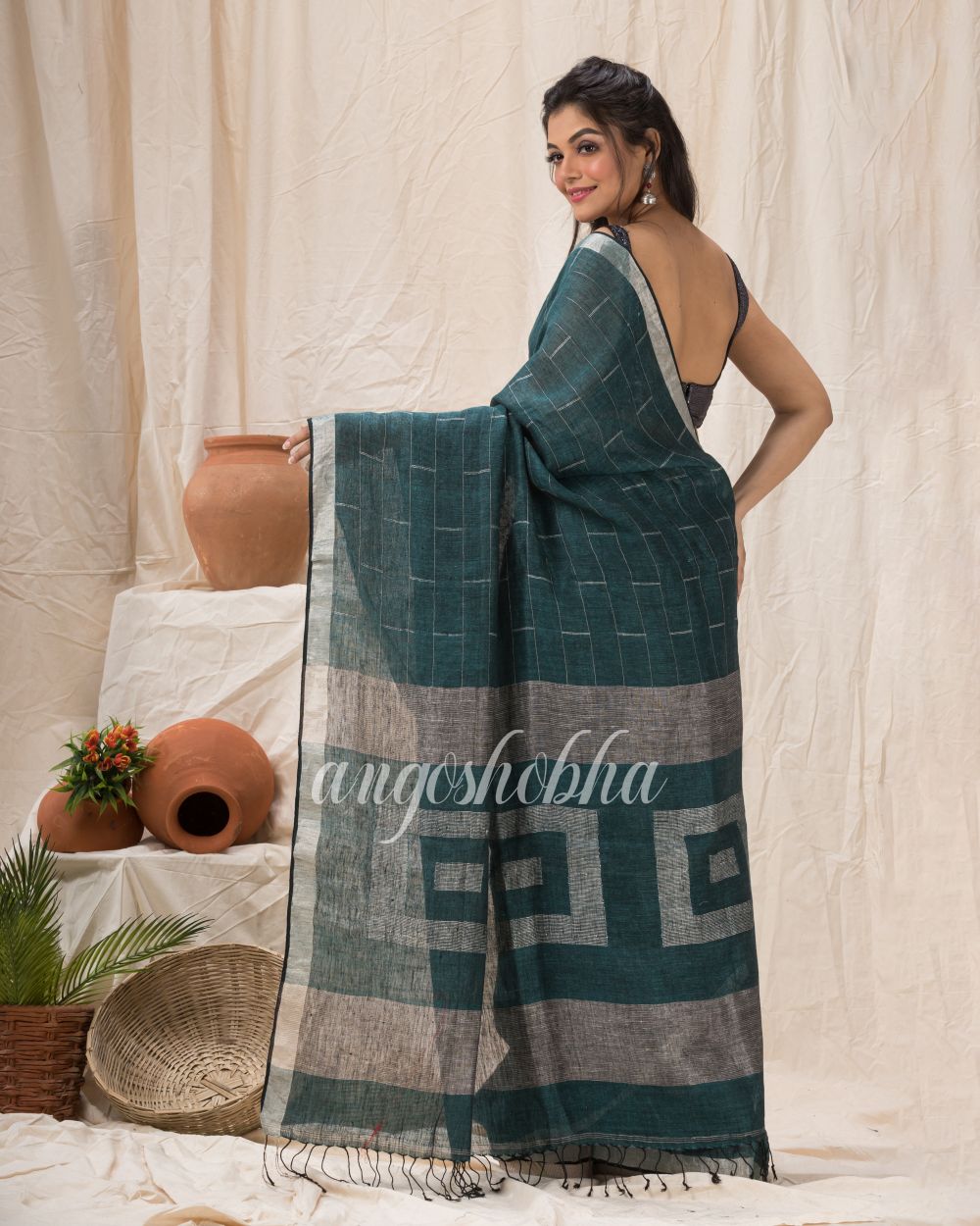 Traditional Dark Green Linen Jamdani Saree angoshobha