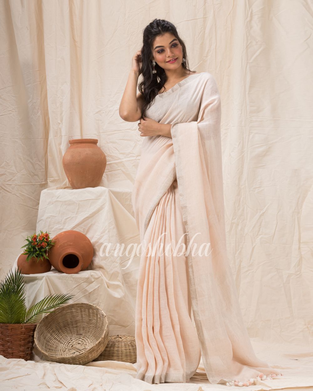 Traditional Faded Pink Handwoven Linen Saree angoshobha