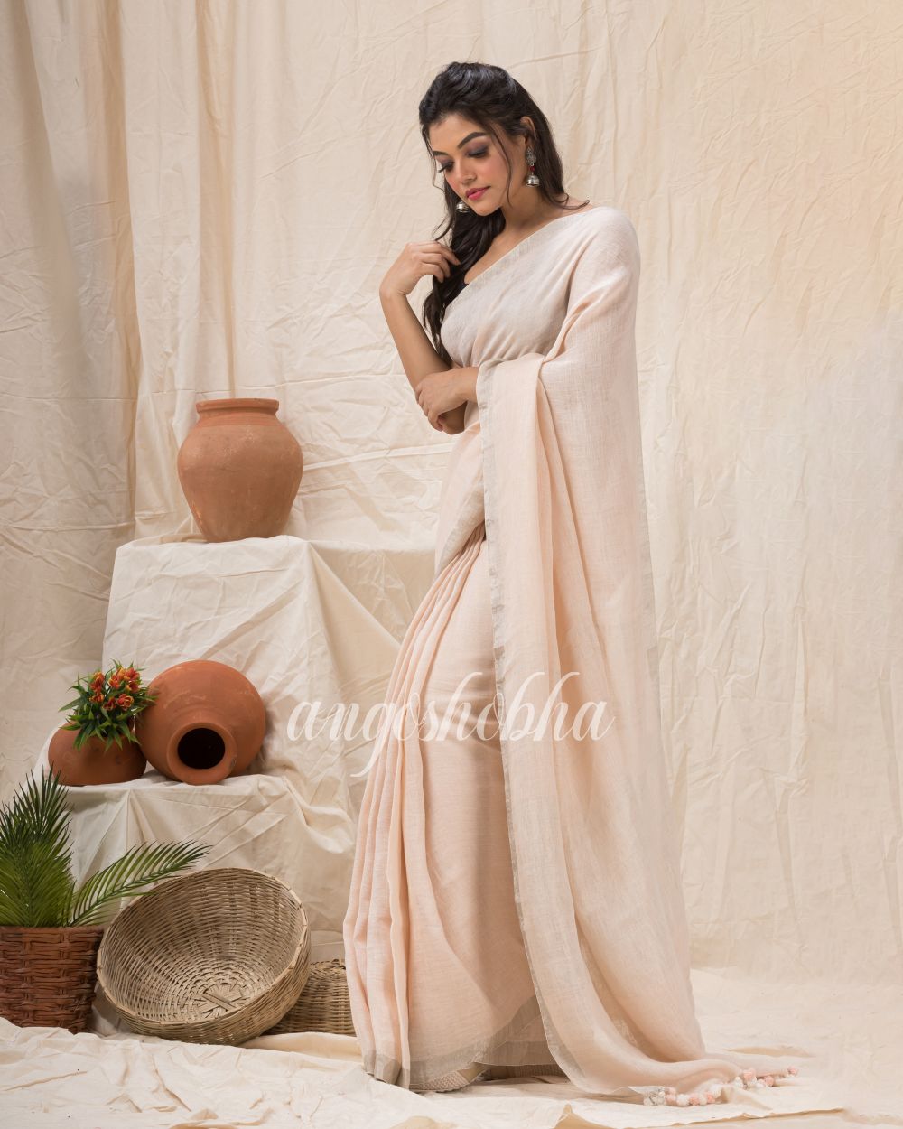 Traditional Faded Pink Handwoven Linen Saree angoshobha