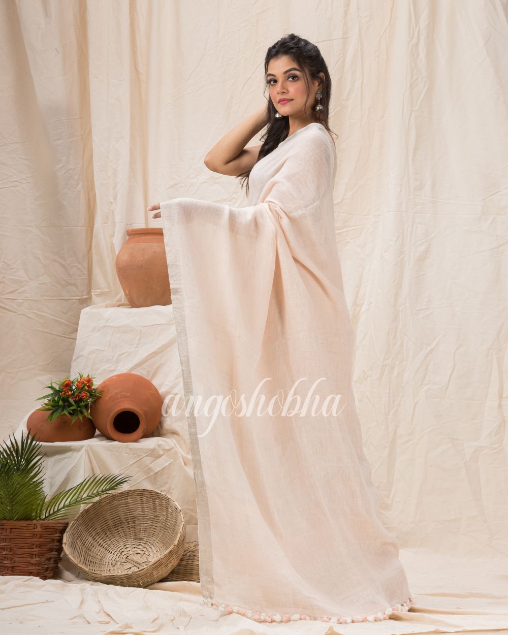 Traditional Faded Pink Handwoven Linen Saree angoshobha
