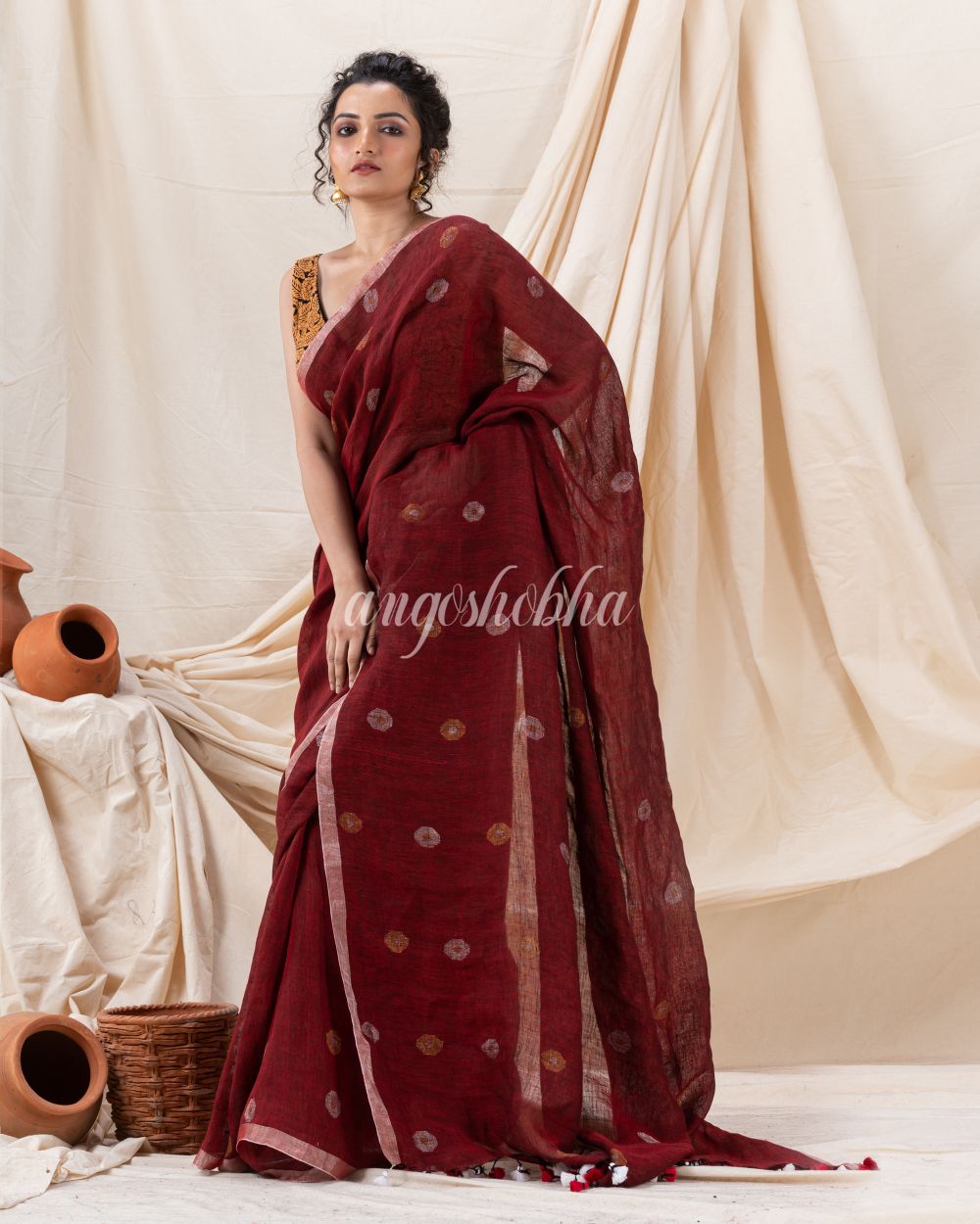 Traditional Maroon Linen Jamdani Saree angoshobha