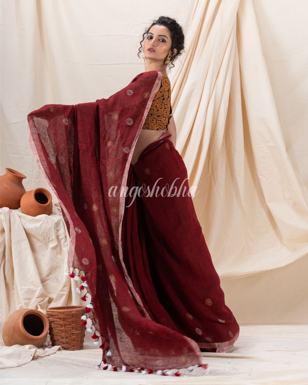 Traditional Maroon Linen Jamdani Saree angoshobha