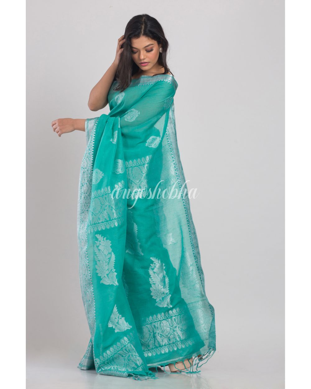 Turquoise Handwoven Linen Saree angoshobha