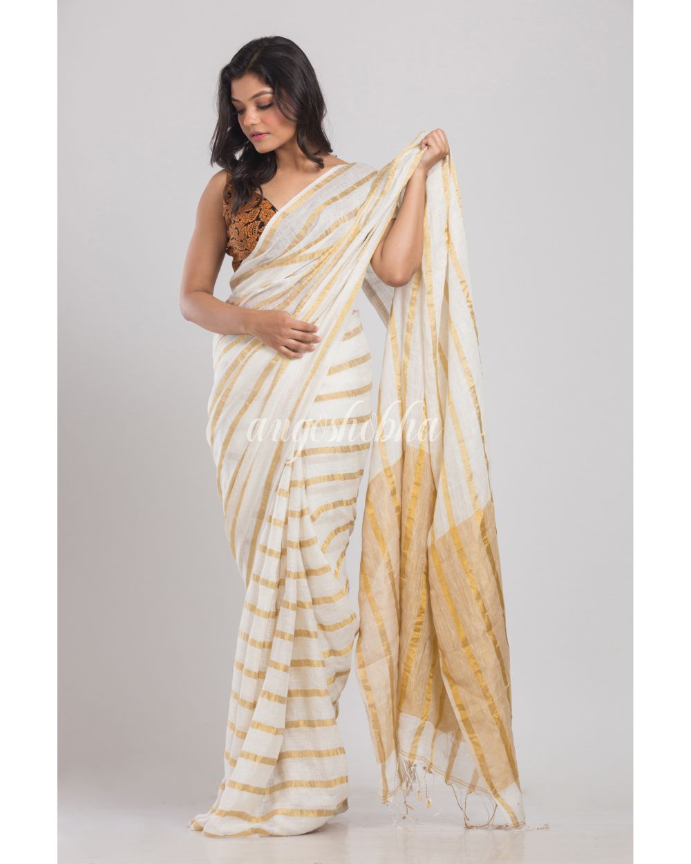 White Handloom Linen Saree angoshobha